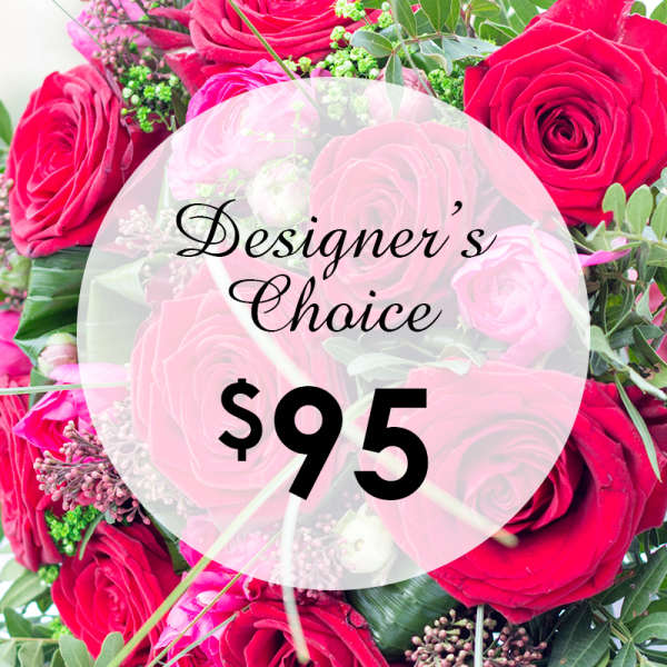 Bouquet of red roses with greenery and a price label
