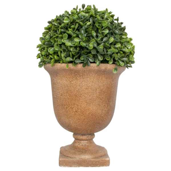 Potted topiary plant in a brown urn-style planter