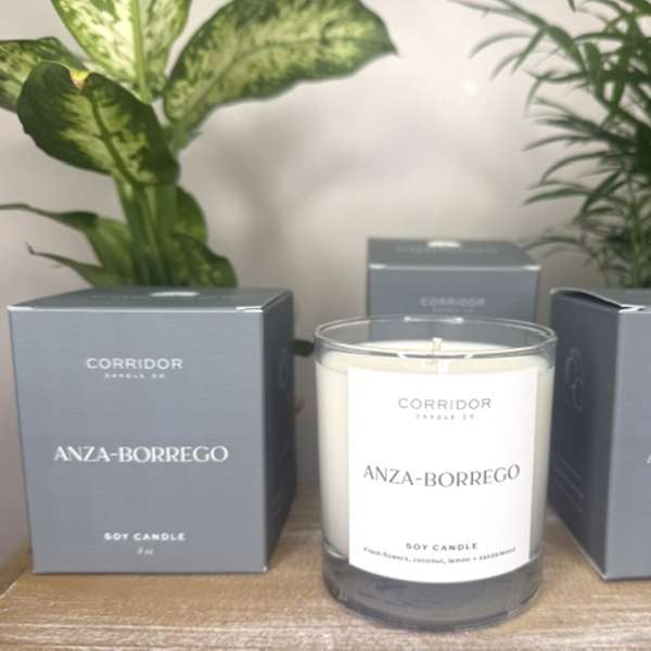 Soy candle in a glass jar with two matching boxes