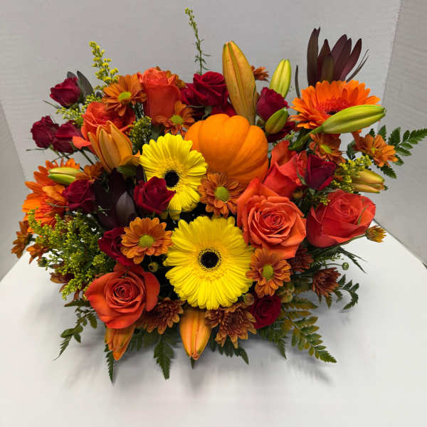 Bright mixed bouquet with roses, gerbera daisies, lilies, and chrysanthemums