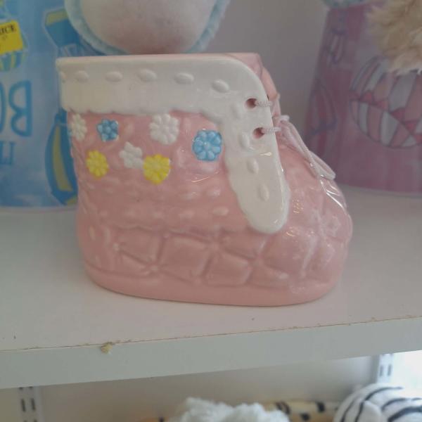 Pink ceramic baby bootie with colorful flower accents