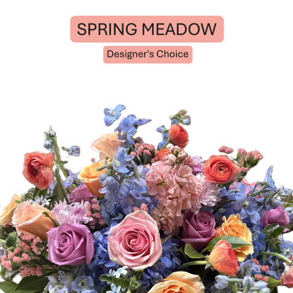 Mixed bouquet of pastel roses, blue flowers, and pink blooms
