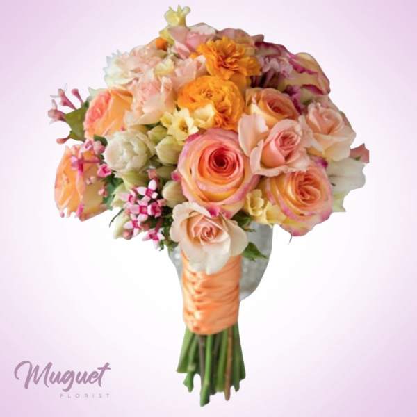 Peach and pink rose bouquet with orange blooms and a satin-wrapped handle