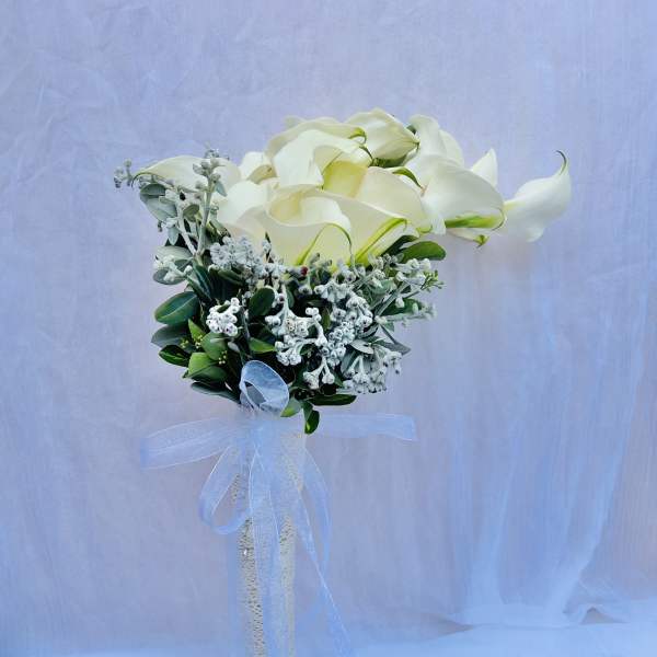 White calla lily bouquet with a sheer ribbon wrap