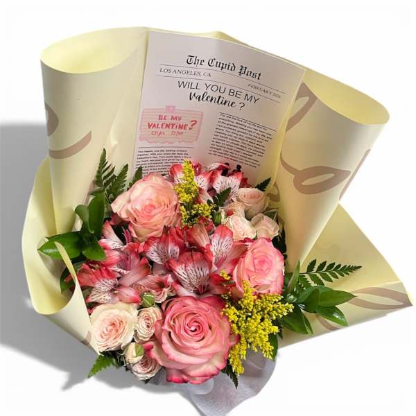 Pink roses and red alstroemeria bouquet with a Valentine card