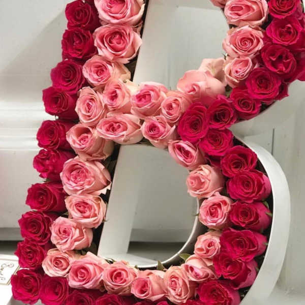 Large floral number 8 covered in pink and red roses