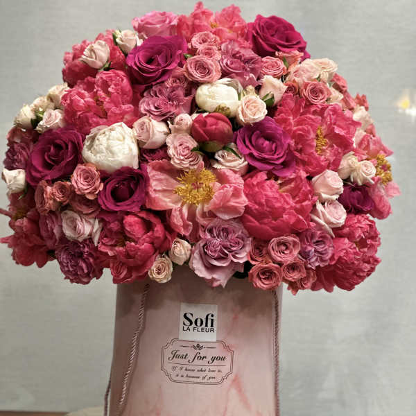 Pink and white rose bouquet in a blush gift box