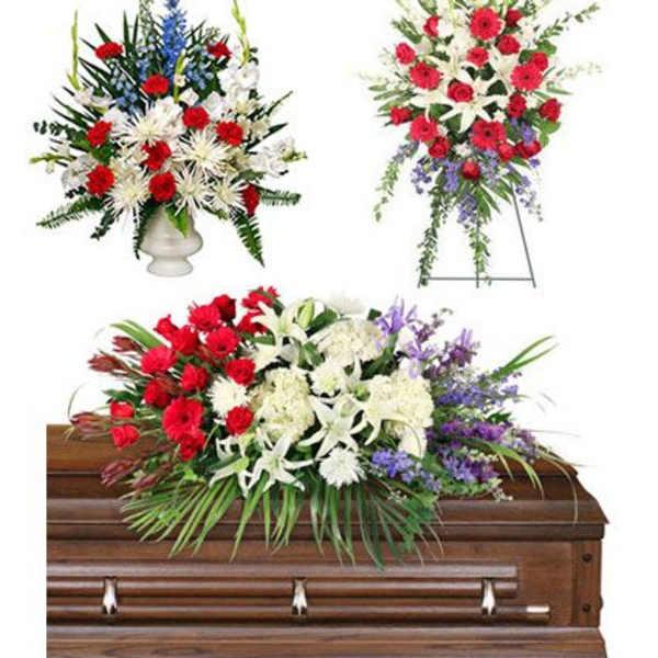 Three floral funeral sprays with a casket arrangement in red, white, and purple