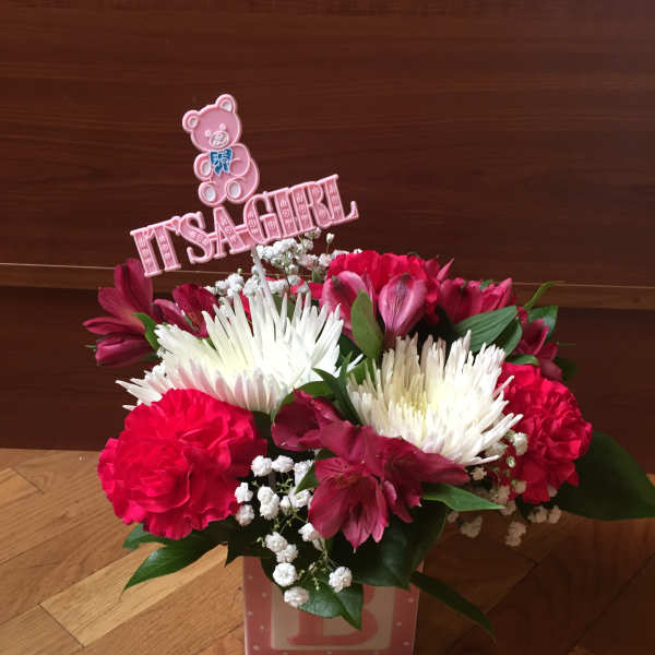 Spider mums, Carnations, alstroemerias for a beautiful baby girl.