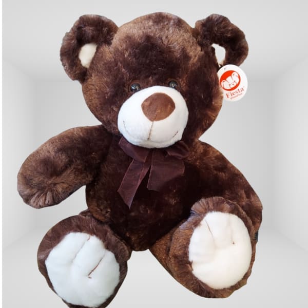 Brown teddy bear plush with a ribbon bow