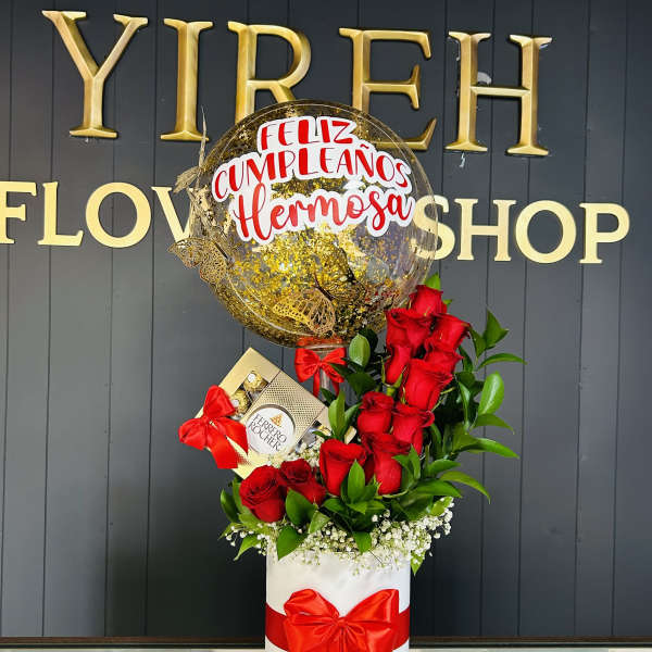 Red roses with a birthday balloon and chocolate box in a white gift box