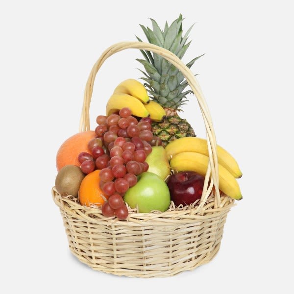 Fruit basket with bananas, grapes, pineapple, apples, oranges, and kiwi