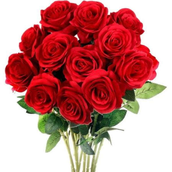Bouquet of red roses with green leaves