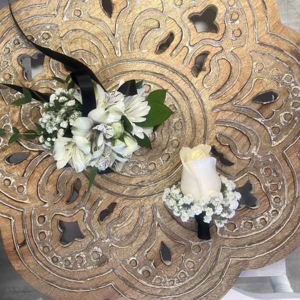 Corsage and boutonniere White