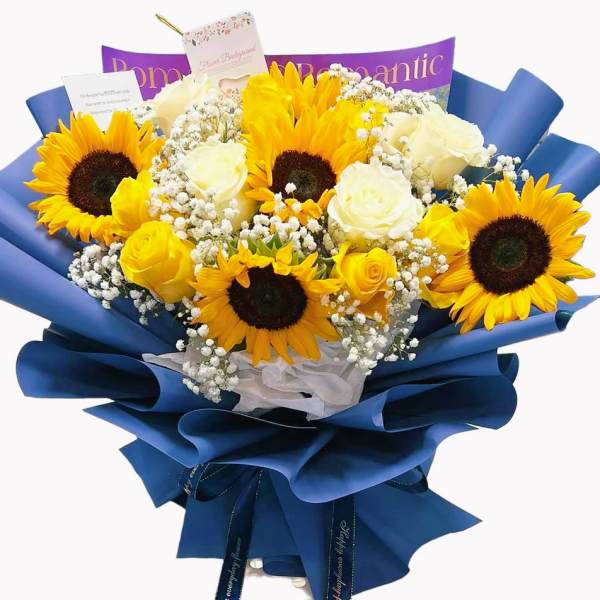 Bouquet of sunflowers and white roses wrapped in blue paper