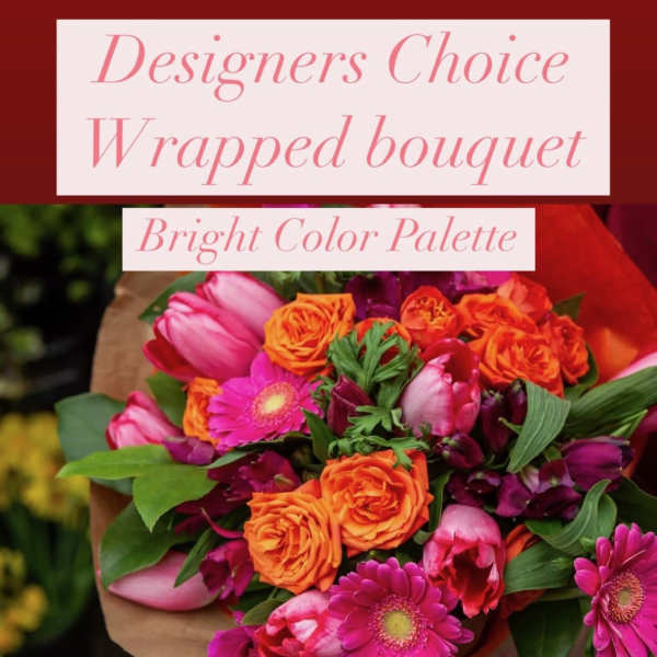 Bright mixed bouquet with pink, orange, and purple flowers wrapped in brown paper