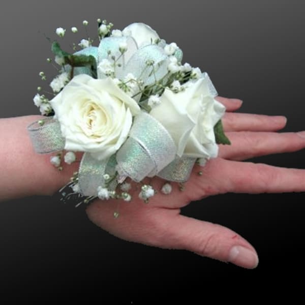 White rose wrist corsage with baby's breath and silver ribbon
