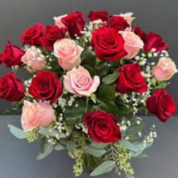 Bouquet of red and pale pink roses with baby's breath