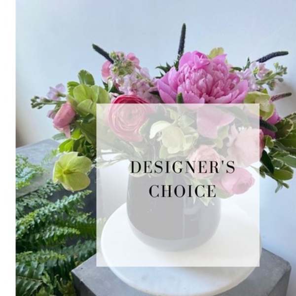 Pink and green mixed bouquet in a white vase