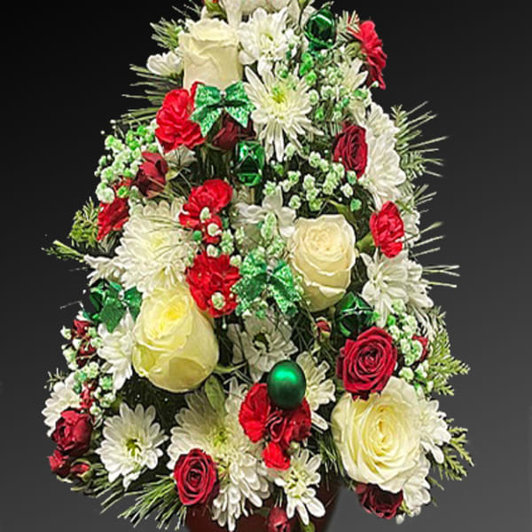 Christmas tree-shaped floral arrangement with red and white flowers