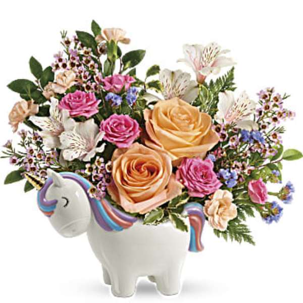 Bouquet of roses and alstroemeria in a unicorn-shaped vase