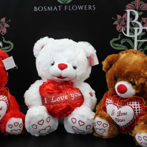 Three plush teddy bears with "I Love You" hearts