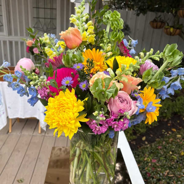 Colorful mixed bouquet in a clear glass vase