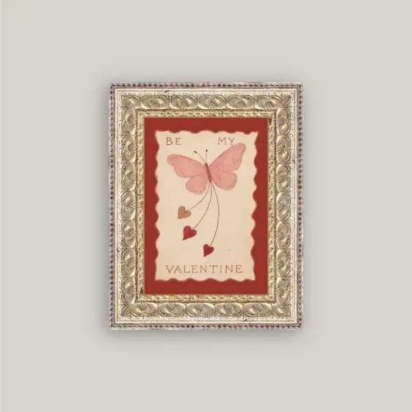 Framed Valentine card with a pink butterfly and hearts