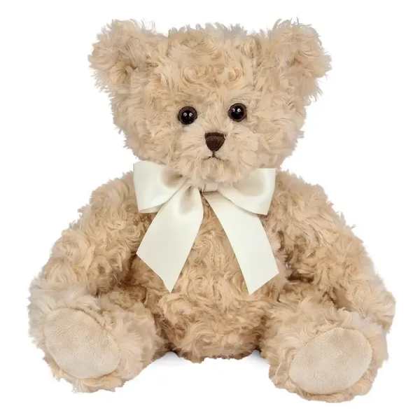 Cream teddy bear with a white ribbon bow