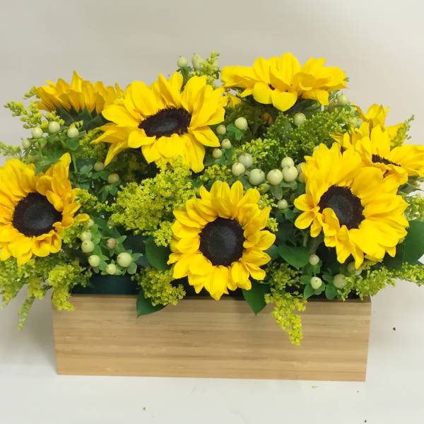 Sunflower arrangement in a rectangular wooden box