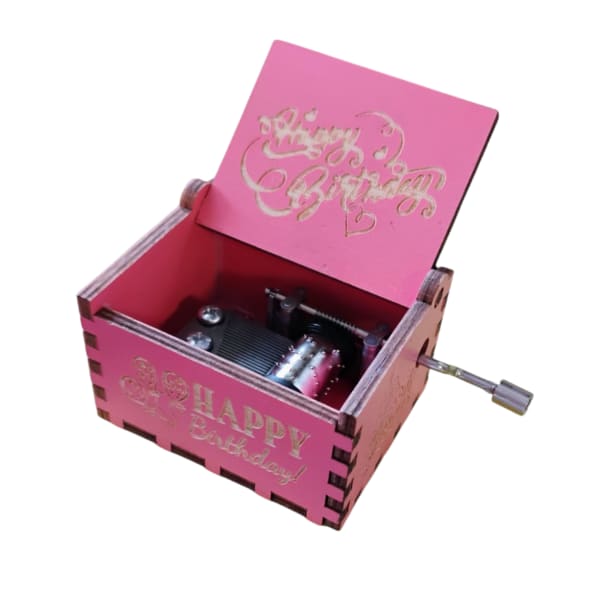 Pink wooden birthday music box with a crank handle