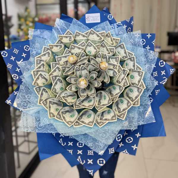 Bouquet made of folded dollar bills with blue wrapping