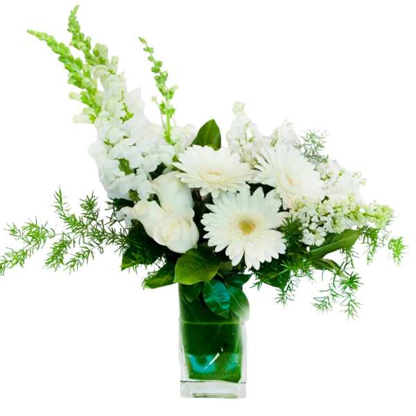 White flowers arranged in a clear glass vase