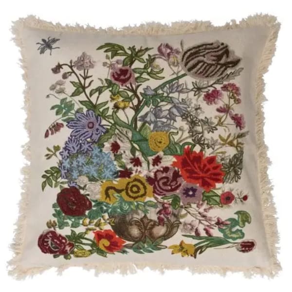 Embroidered floral pillow with fringe trim