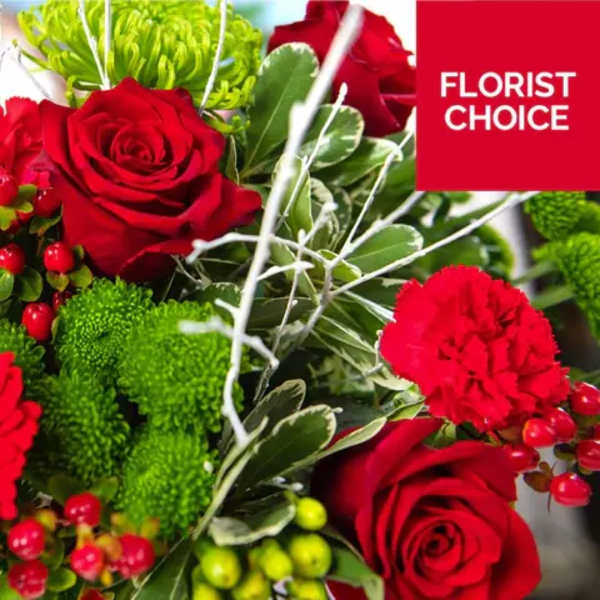 Red roses and green chrysanthemums with berries and white twigs