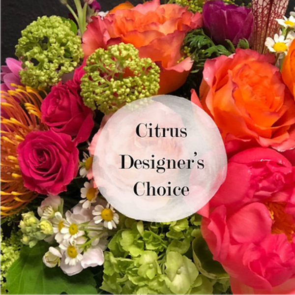 Bright mixed bouquet with orange and pink roses and green hydrangeas