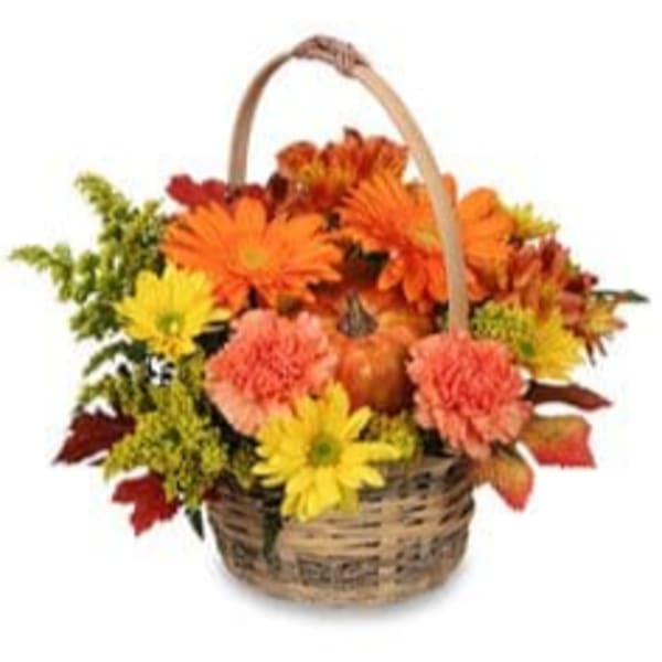 Basket of orange, yellow, and pink flowers with a handle