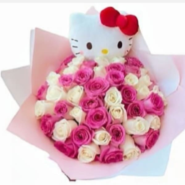 Bouquet of pink and white roses with a Hello Kitty plush topper
