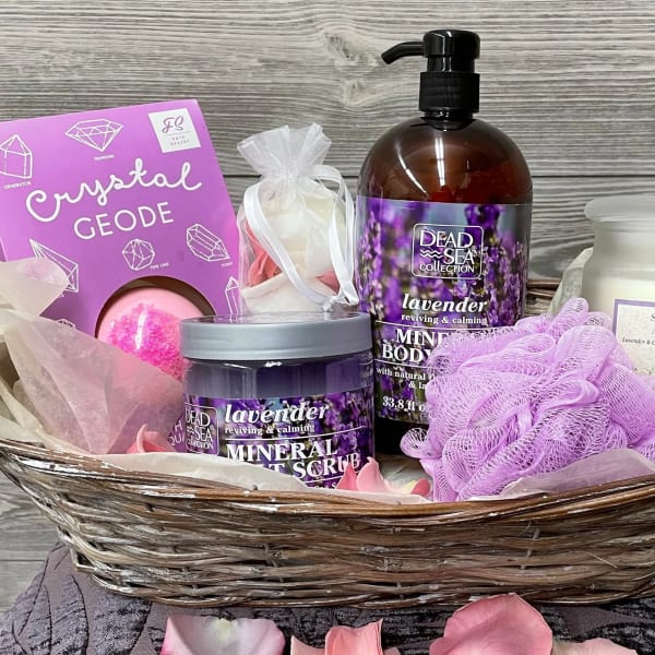 Spa gift basket with lavender bath products and a crystal geode bath bomb