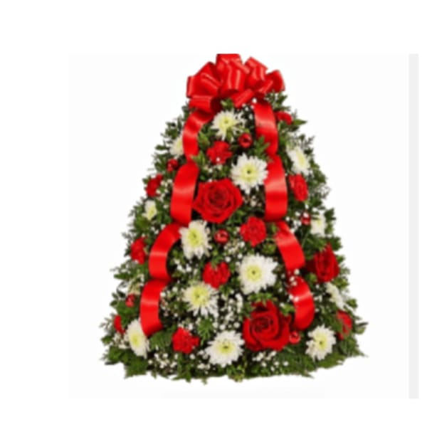 Triangular floral arrangement with red roses, white daisies, and red ribbon