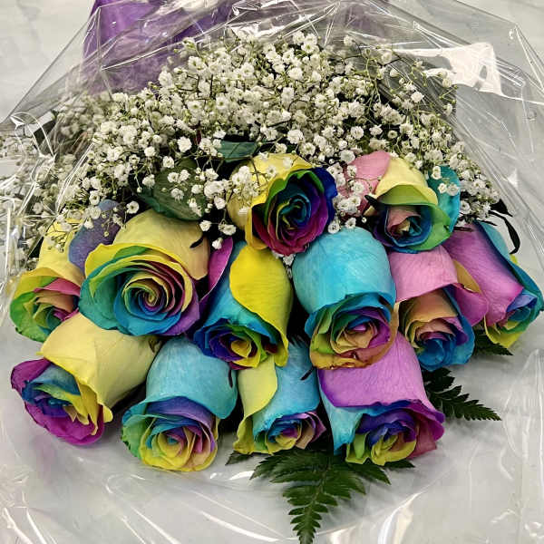 Bouquet of rainbow-colored roses with white baby's breath