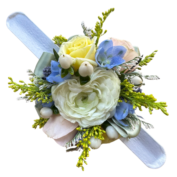 Small pastel corsage with blue and white flowers on a ribbon