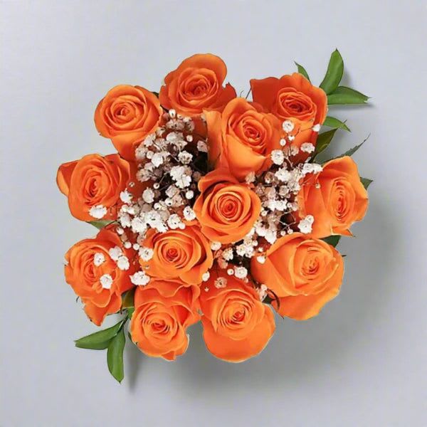Bouquet of orange roses with white baby's breath