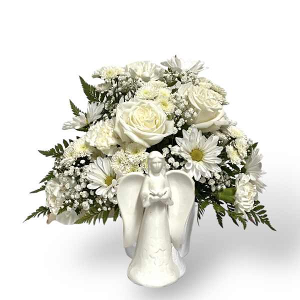 White floral arrangement with roses and daisies in an angel vase
