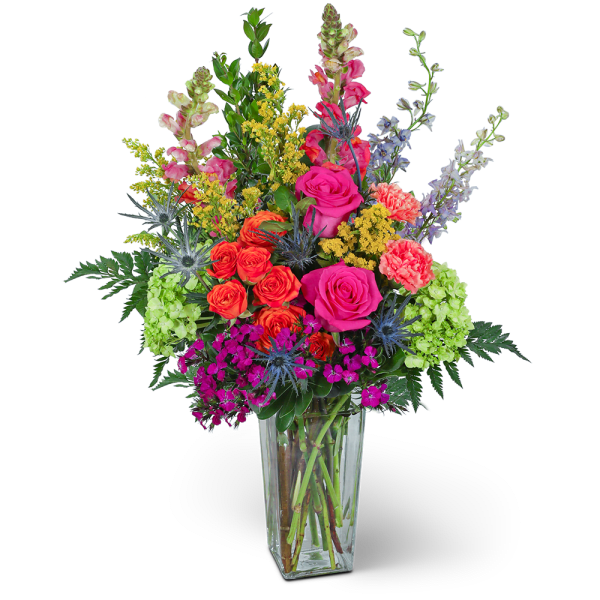 Colorful mixed bouquet in a clear glass vase