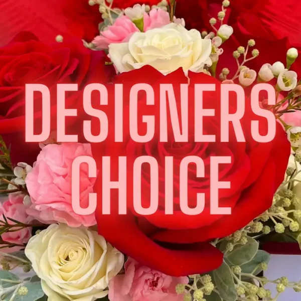 Red, pink, and white roses with small filler flowers