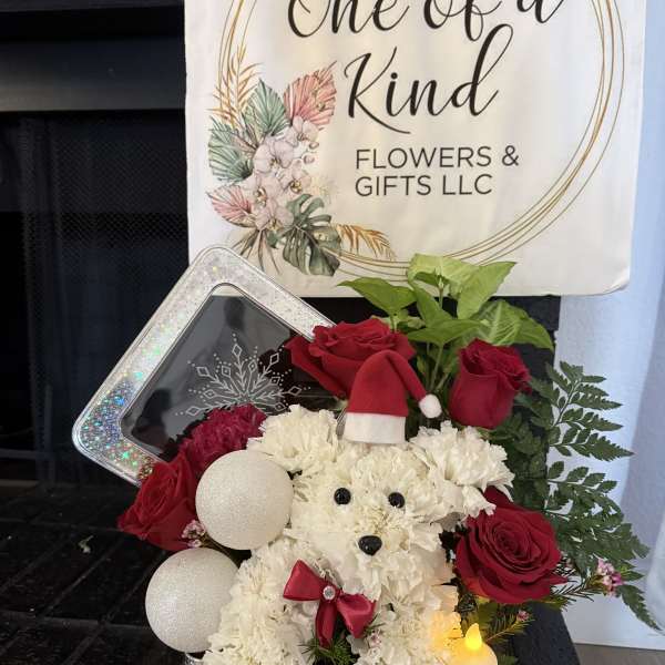 White teddy bear floral arrangement with red roses and ornaments in a tin box
