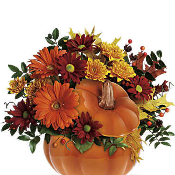 Pumpkin-shaped vase with orange and burgundy flowers