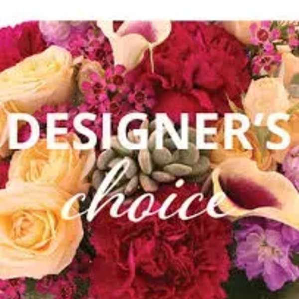 Mixed bouquet of roses, calla lilies, and purple flowers