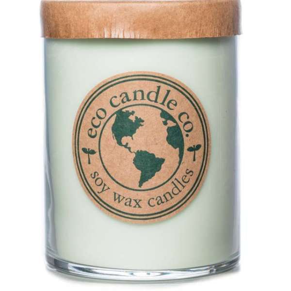 Soy wax candle in a glass jar with a wooden lid